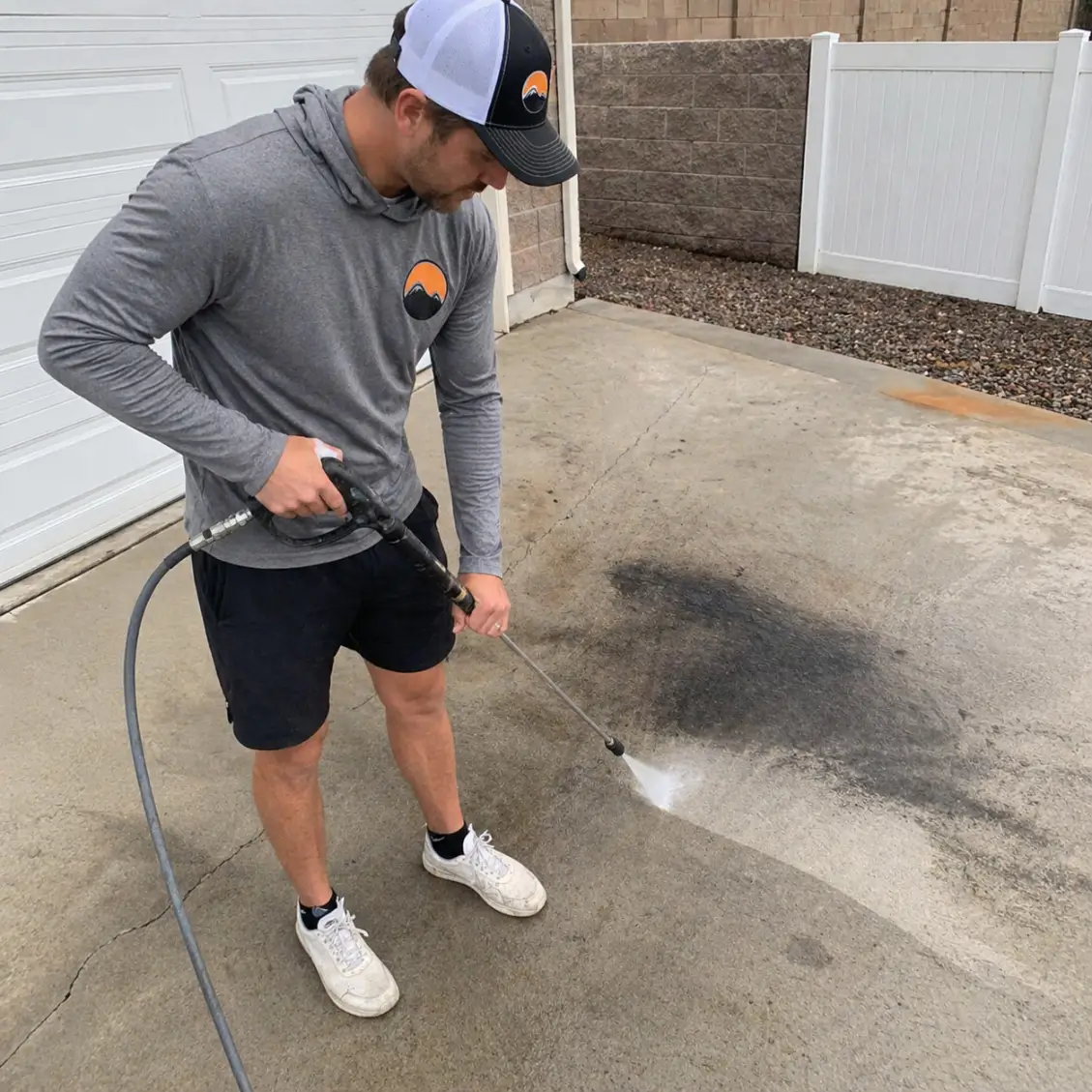 Pressure washing with a wand in Kennewick for oil, rust, or stain